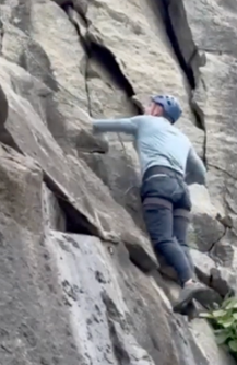 Robbie Allen rock climbing